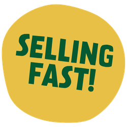 Participants in green “Run for Wildlife at Dublin Zoo” take a selfie with their medals at the finish line.