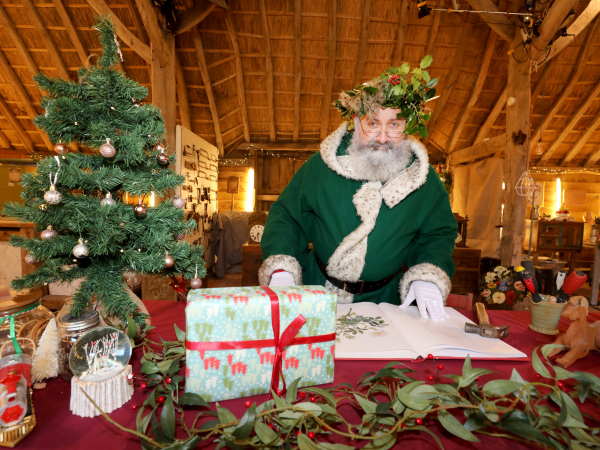 Green Father Christmas' Elf School