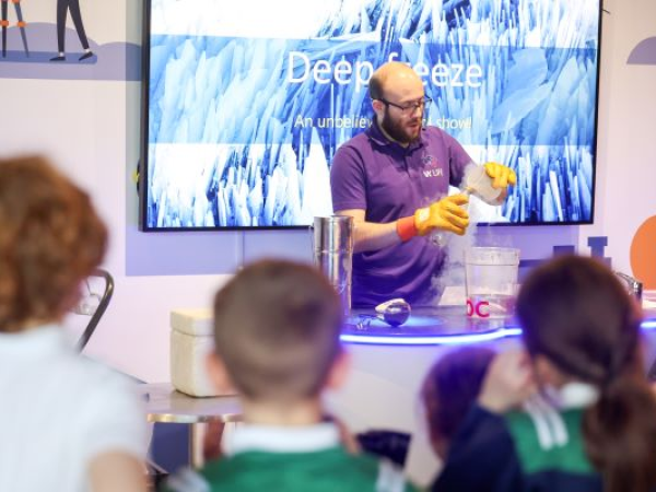 Science Communicator demonstrating liquid nitrogen