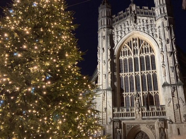 Image showing Bath Abbey at night, with a large Christmas Tree in the foreground.