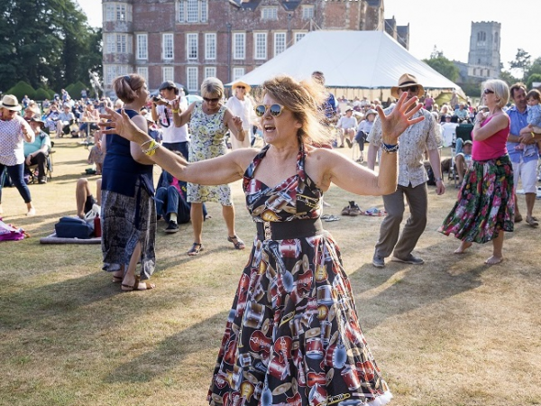 Person dancing in sunshine