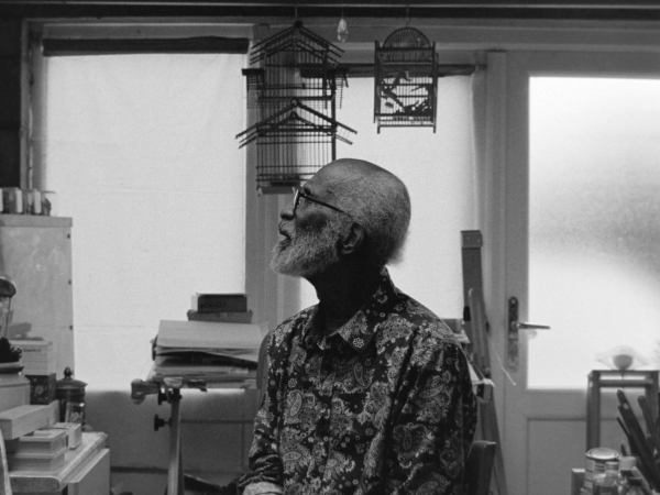 A man sat in a studio.