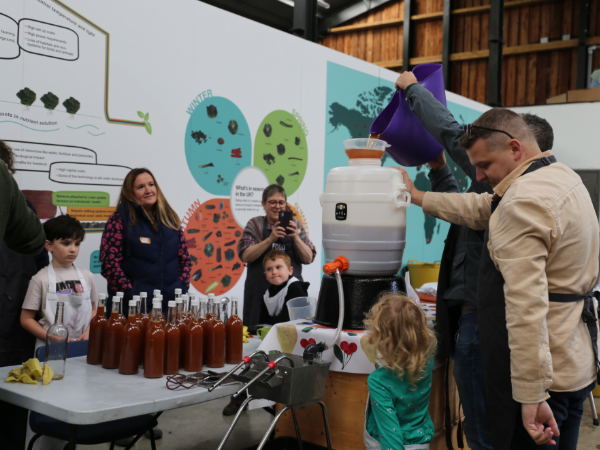 Participants enjoying an apple pressing session