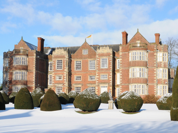 Late night Christmas opening, with carol singing
