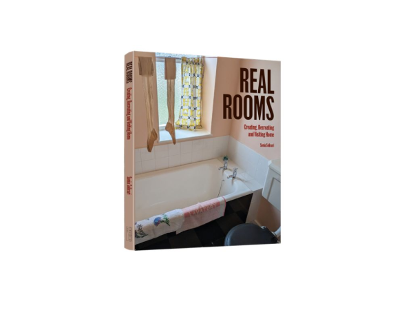 An image of the books front cover depicts a photo of a bathtub and window. The title reads 'Real Rooms: Creating, Recreating and Visiting Home'