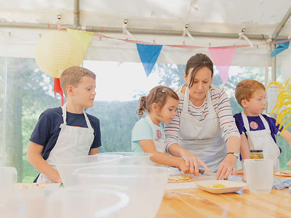 Visitors taking part in a baking workshop