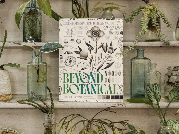 An image of the book 'Beyond Botanicals' illustrated with plants on the cover. The book sits on shelving surrounded by plant cuttings in glass jars.