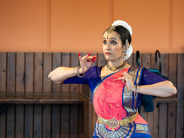 Lady wearing a sari dancing