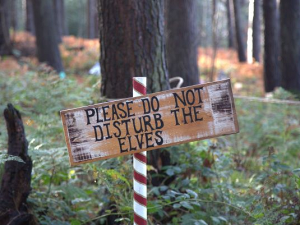 Sign reading 'Please do not disturb the elves'