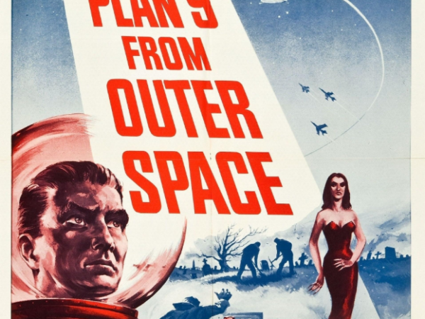 Film poster with title Plan 9 from Outer Space, with person wearing spacesuit.