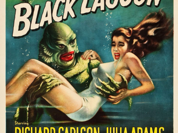 Film poster with title Creature from the Black Lagoon, with alien creature carrying a person underwater.
