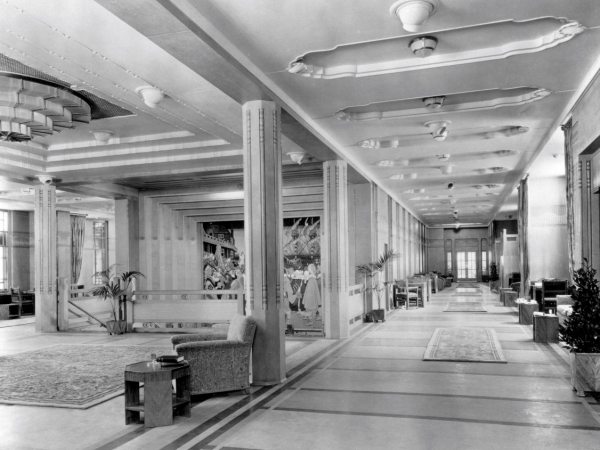 A black and white photograph of a grand hallway from the Empress of Britain