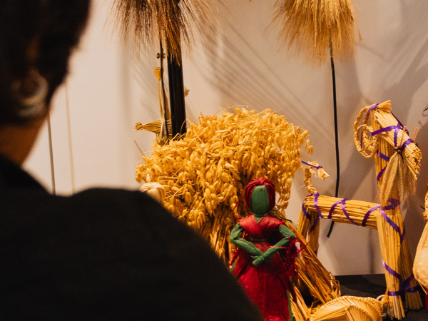 A Yule Goat displayed alongside other straw creations.The Yule goat is a straw bundles into the shape of a four-legged creature.