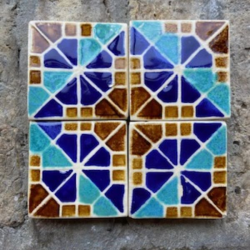 Blue and cognac geometric tiles, set of 4 by Alisha Kaliciak
