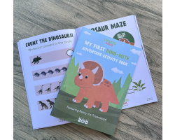 young childs dinosaur puzzle book with a triceratops drawing on the cover and the zoorassic trail logo.