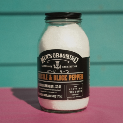 Glass jar thistle and black pepper bath soak