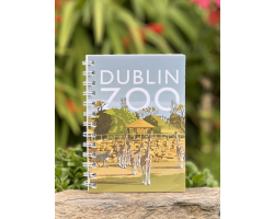a spiral bound notebook with a cover that displays the dublin zoo name and an art image of giraffes in their habitat.