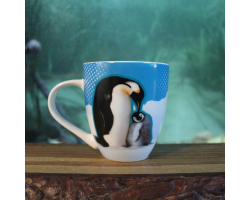 Ceramic mug with penguin design