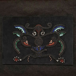 Bird and a snake, traditional embroidery for xhubleta by Vildana Killian
