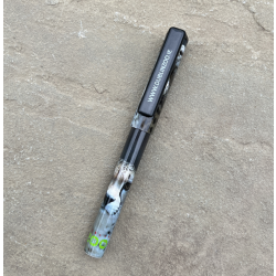 a pen displaying a photo of a cheetah and the dublin zoo logo and website address.