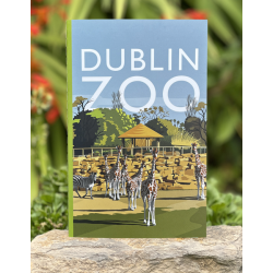 a copybook with a soft cover displaying the dublin zoo name and an art image of giraffes in their habitat.