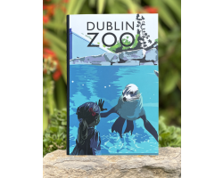 a copybook with a cover displaying the dublin zoo name and an art image of a sealion and a child.