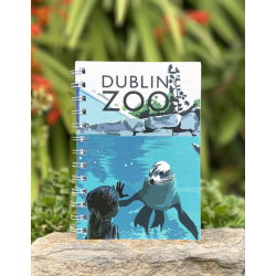 spiral b00ound notebook with a image of a sealion and a child on the front.