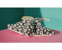 Mini spotty black and white eagle ray soft toy with white underbelly.