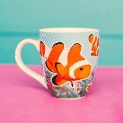 Ceramic mug with bright clownfish design