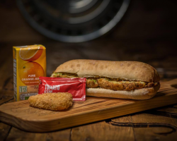 VEGAN Sausage Ciabatta Roll - Served with hash brown and Orange Juice